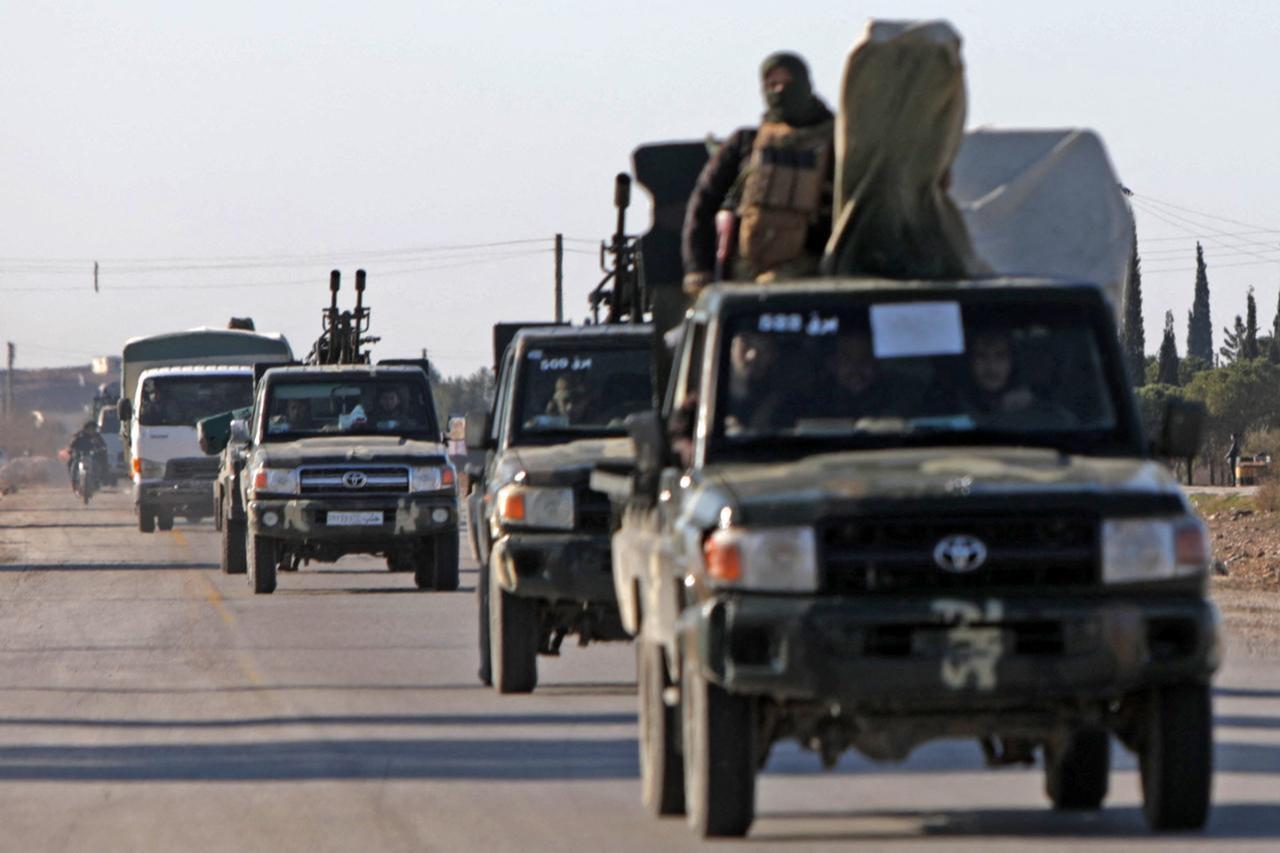 Syrian government military reinforcements arrive via the international M4 highway to the Dayr Hafir area, east of Aleppo city, Syria on Jan. 14, 2026. (AFP Photo)