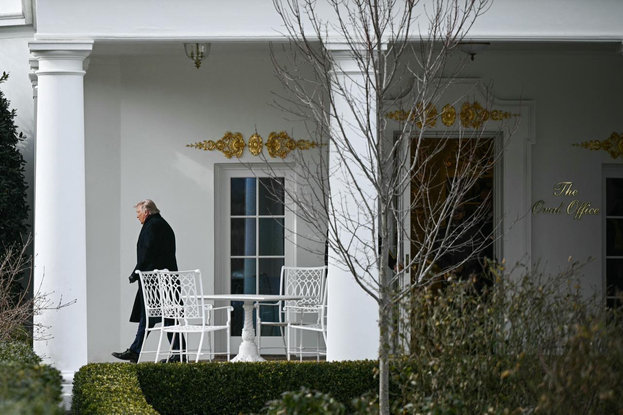US President Donald Trump exits the Oval Office as he walks to board Marine One on the South Lawn of the White House in Washington, DC, on January 16, 2026. (AFP Photo)