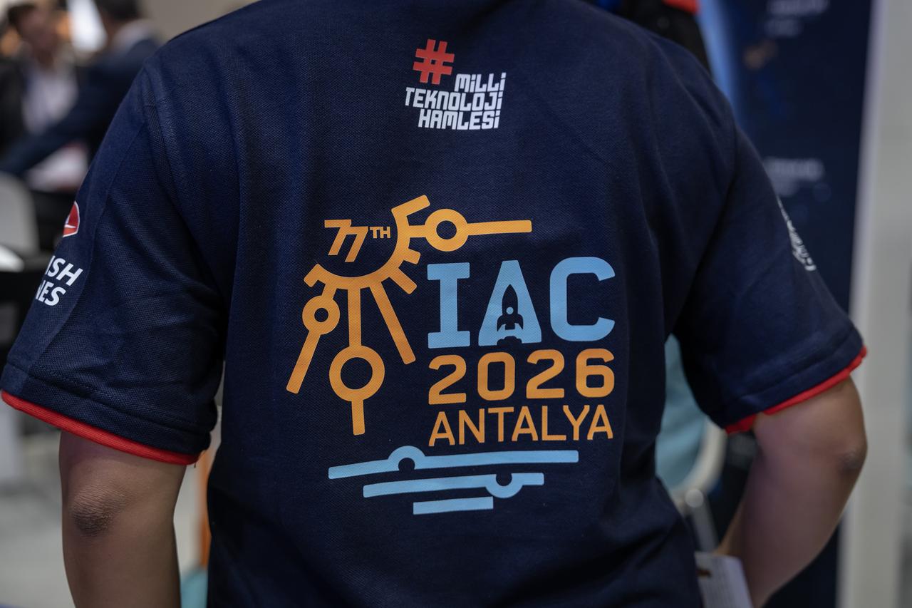 Gifts from Turkish companies and universities are being presented to participants from various countries through a raffle held at the end of the program at the Turkish Pavilion within a special event, organized at the Turkish Pavilion to promote the 77th IAC 2026 Antalya, during the 76th International Astronautical Congress at the International Convention and Exhibition Centre in Sydney, Australia on Sept. 30, 2025. (AA Photo)