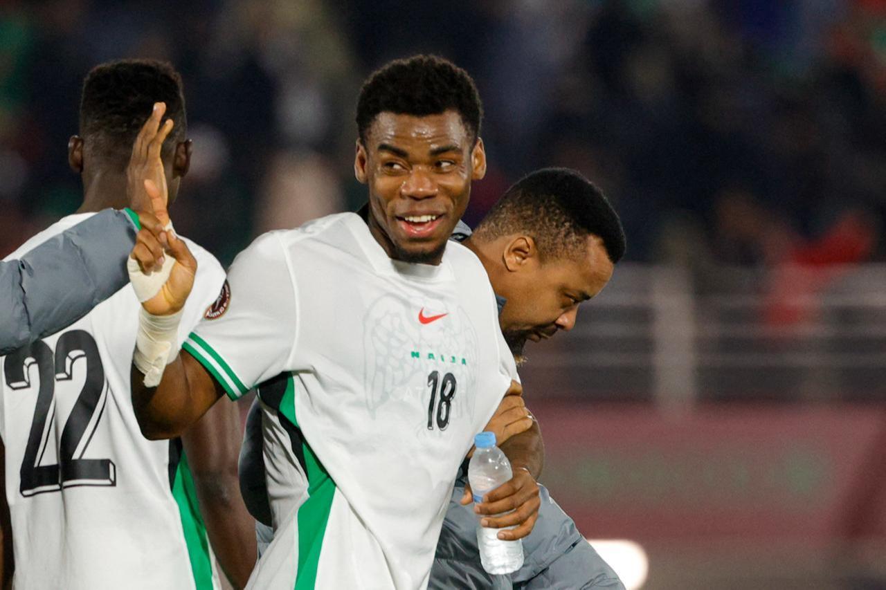 Nigerias midfielder #18 Raphael Onyedika celebrates with teammates at Fes Stadium in Fes, Morocco, December 30, 2025. (AFP Photo)