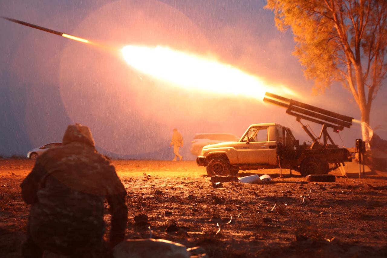 Syrian government forces launch a rocket towards SDF near Dibsi Faraj in the northern Syrian Tabqa area, Raqqa province, on January 17, 2026. (AFP Photo)