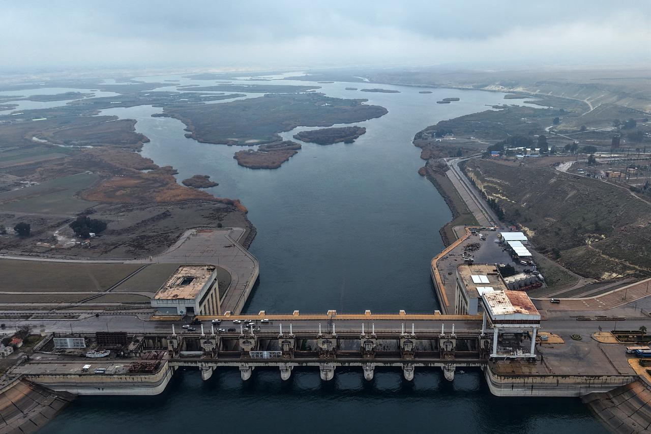 This aerial photograph, taken on January 18, 2026, shows a view of the Euphrates Dam in Tabqa, in Raqqa province. (AFP PHoto)