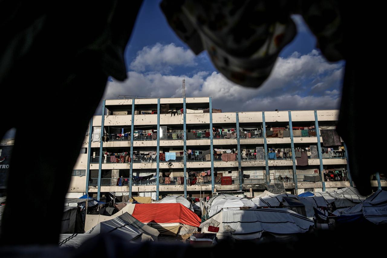 Palestinian families, living around the courtyard of a school, struggle to continue their daily lives under harsh conditions at Tel al-Hawa neighborhood in Gaza city, Gaza on Jan. 15, 2026. (AA Photo)