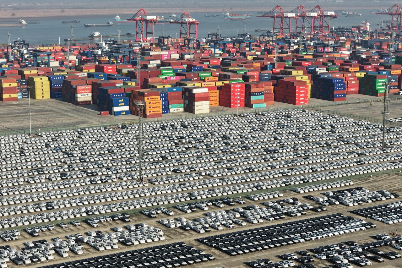 Cars waiting for export at the Longtan Container Terminal in Nanjing Port, in eastern China's Jiangsu Province, 14 January 2026. (AFP Photo)