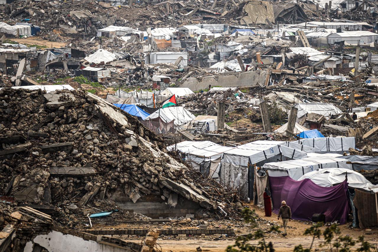 Displaced Palestinian families living in the Jabalia area continue their daily lives under harsh conditions amid the rubble left by Israeli attacks, in Gaza City, Gaza, Jan. 18, 2026. (AA Photo)
