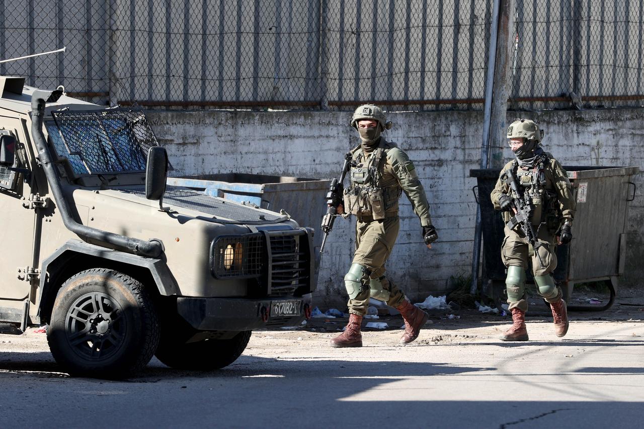 Israeli forces detain two Palestinians and besiege a mosque during a raid in Nablus, West Bank on January 11, 2026. (AA Photo )