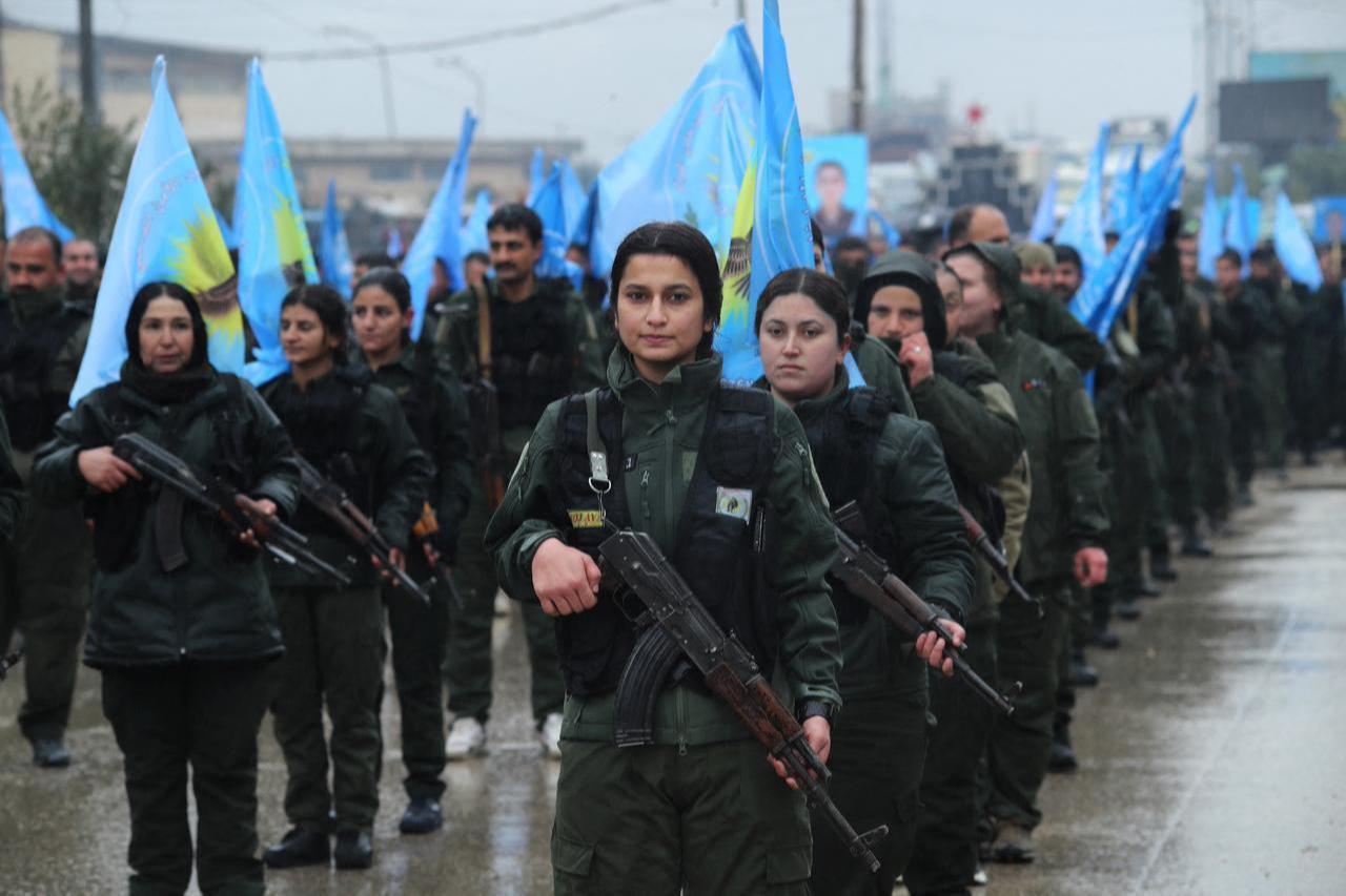 Members of the so-called "Asayish", rally during a demonstration in Qamishli, in the Syria's northeast, January 18, 2026. (AFP Photo)