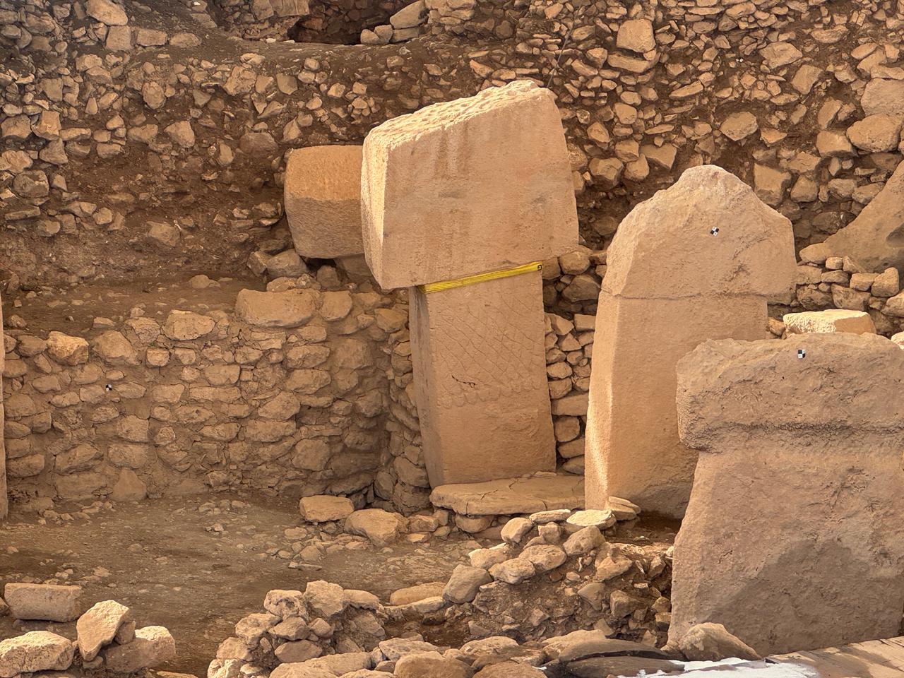 T-shaped limestone pillars uncovered at Gobeklitepe are seen during ongoing conservation and excavation works at the prehistoric site in southeastern Türkiye. (AA Photo)