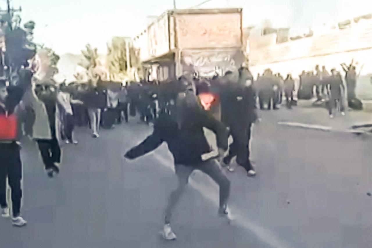 This grab taken on January 2, 2026, from UGC images posted on social media on December 31, 2025, shows protestors attacking a government building in Fasa, in southern Iran on December 31, 2025. (AFP Photo / UGC / Anonymous HO)
