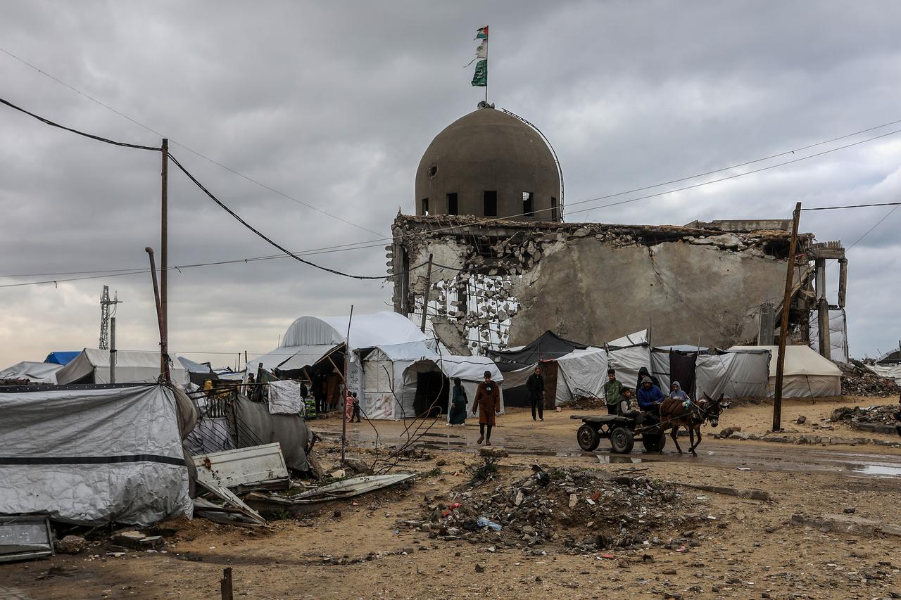 Palestinian families deprived of basic necessities are clinging to life in makeshift tents erected near their destroyed homes, battling harsh cold weather conditions in Khan Yunis, Gaza, Jan. 2, 2026. (AA Photo)