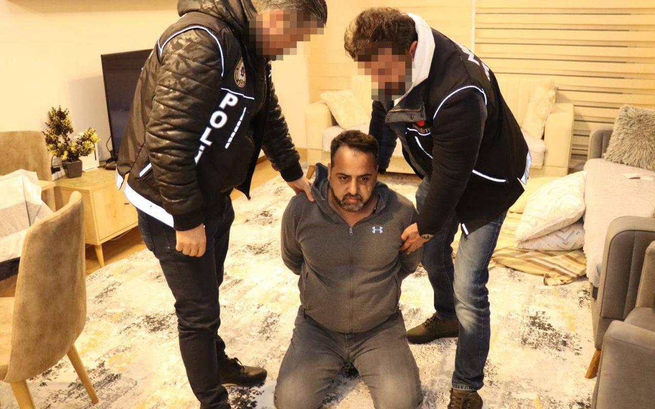 Zafer Ramadan, an international drug trafficker wanted under the code G-42, is detained during an operation in Mersin, Türkiye, Dec. 22, 2023. (AA Photo)