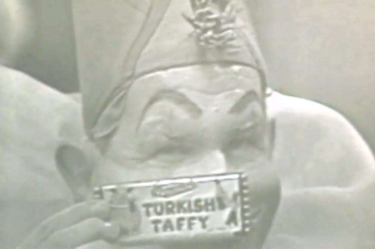 Bonomo’s Turkish Taffy box and The Magic Clown, the NBC TV show sponsored by Bonomo, United States. (Photo via YouTube)