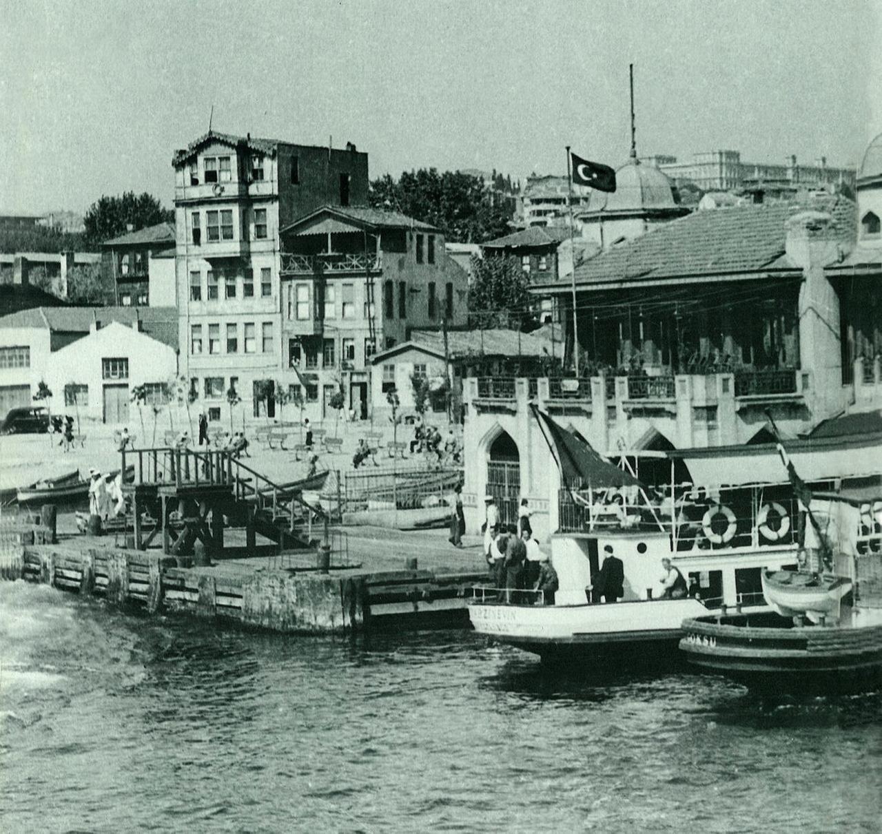 A busy scene at Besiktas Pier, with small boats docked along the shore, and people walking near the waterfront, Besiktas, Istanbul, Türkiye, 1948. (Photo via Eski Istanbul)
