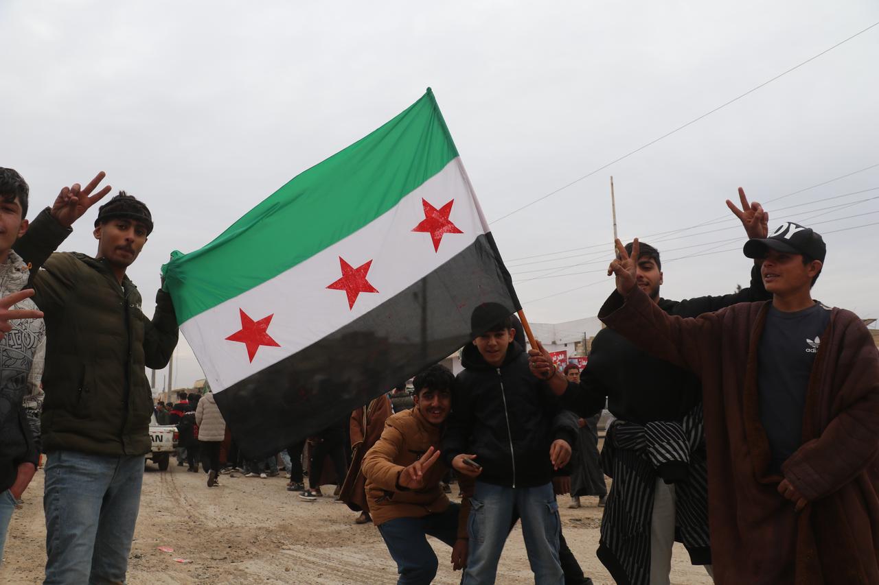 Syrian civilians celebrate in the streets after the town of Maskanah, west of the Euphrates River, came under the control of the Syrian army in Aleppo, Syria, Jan. 17, 2026. (AA Photo)