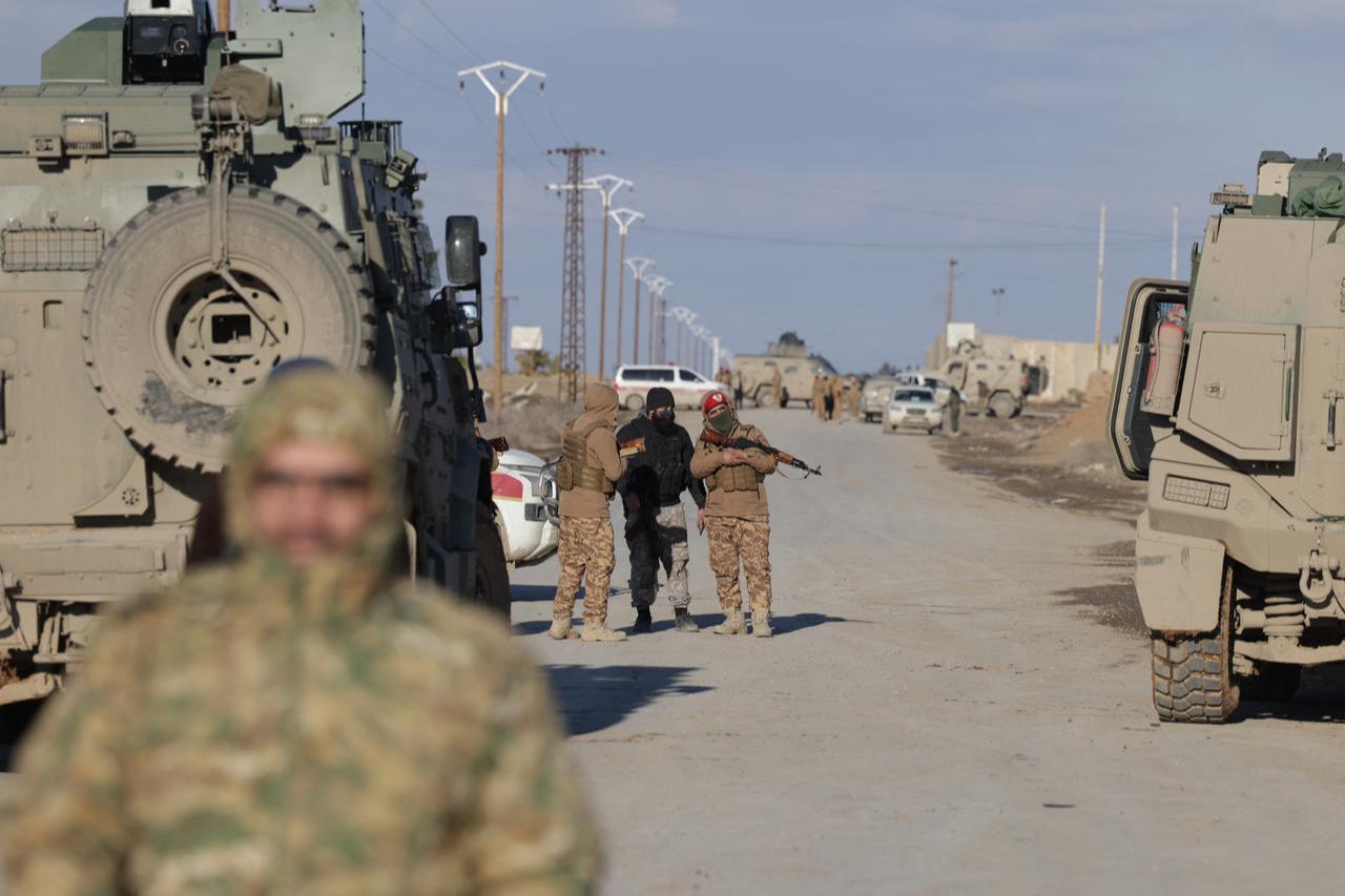 Syrian government forces take possession of an SDF military base as they enter the city of Raqqa, Syria, January 19, 2026. (AFP Photo)