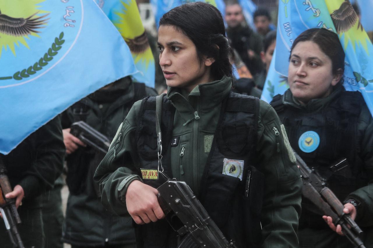 Members of the terrorist organization YPG/SDF's so-called "Asayish" rally during a demonstration in Qamishli,  Syria, January 18, 2026. (AFP Photo)