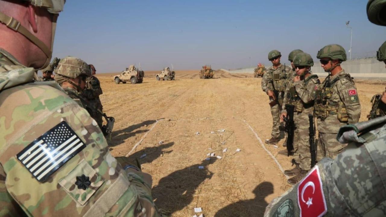 U.S. and Turkish troops conduct their third joint ground patrol within a planned safe zone in northern Syria, along the Syrian-Turkish border in Tall Abyad, Syria on October 04, 2019. (AA Photo)
