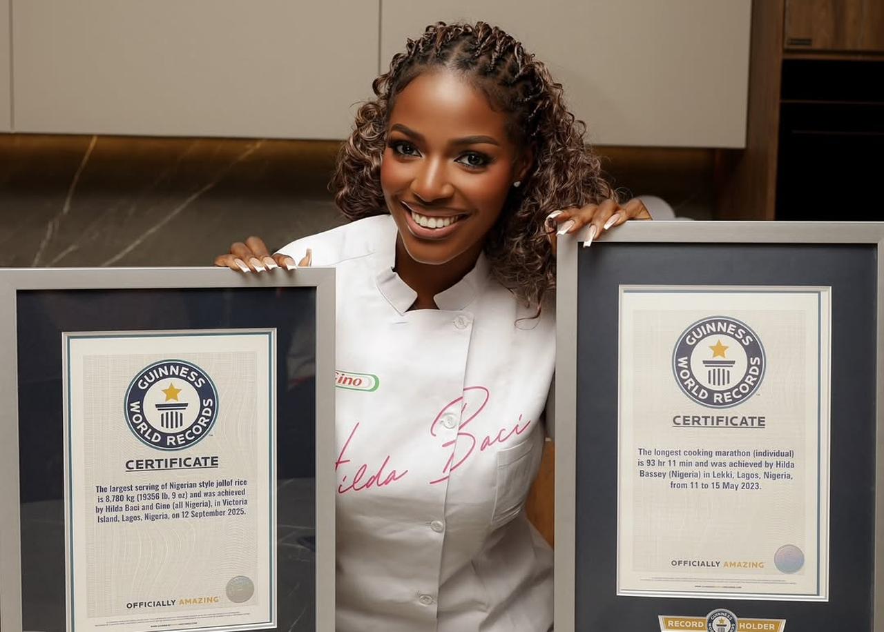 Hilda Baci poses with her Guinness plaques after earning two rice serving records, Lagos, Nigeria, November 6, 2025. (Photo via Instagram / @hildabaci)