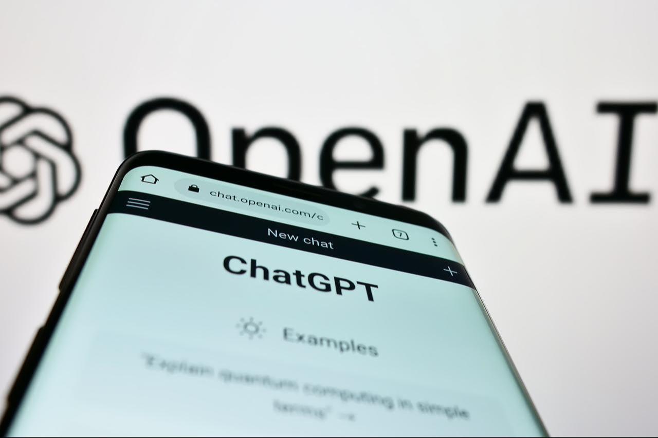 A smartphone screen displays the ChatGPT interface on OpenAI’s website. (Adobe Stock Photo)