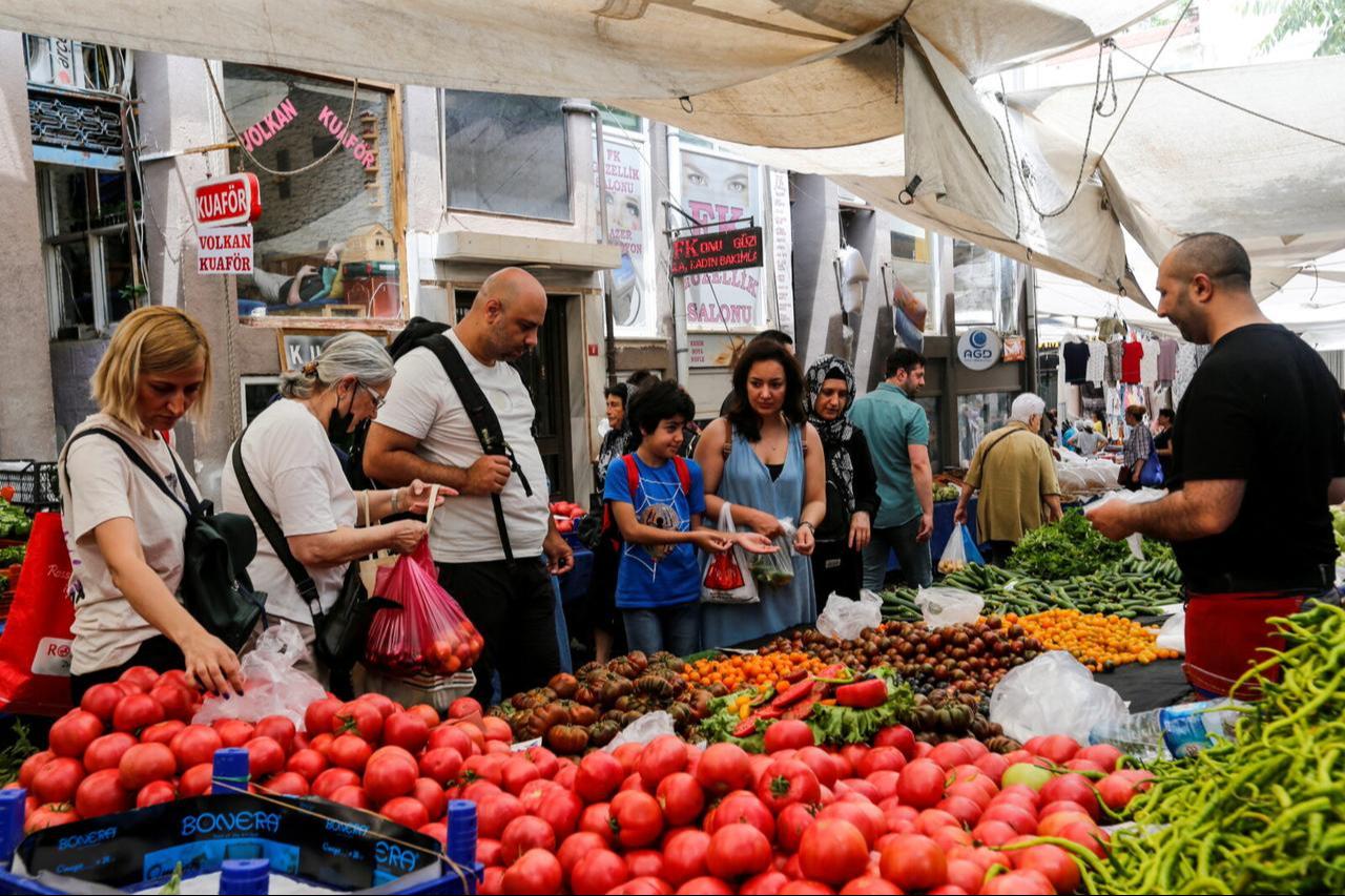 People shop at an open market in Istanbul, Türkiye, June 10, 2022. (Photo via Dilara Senkaya)