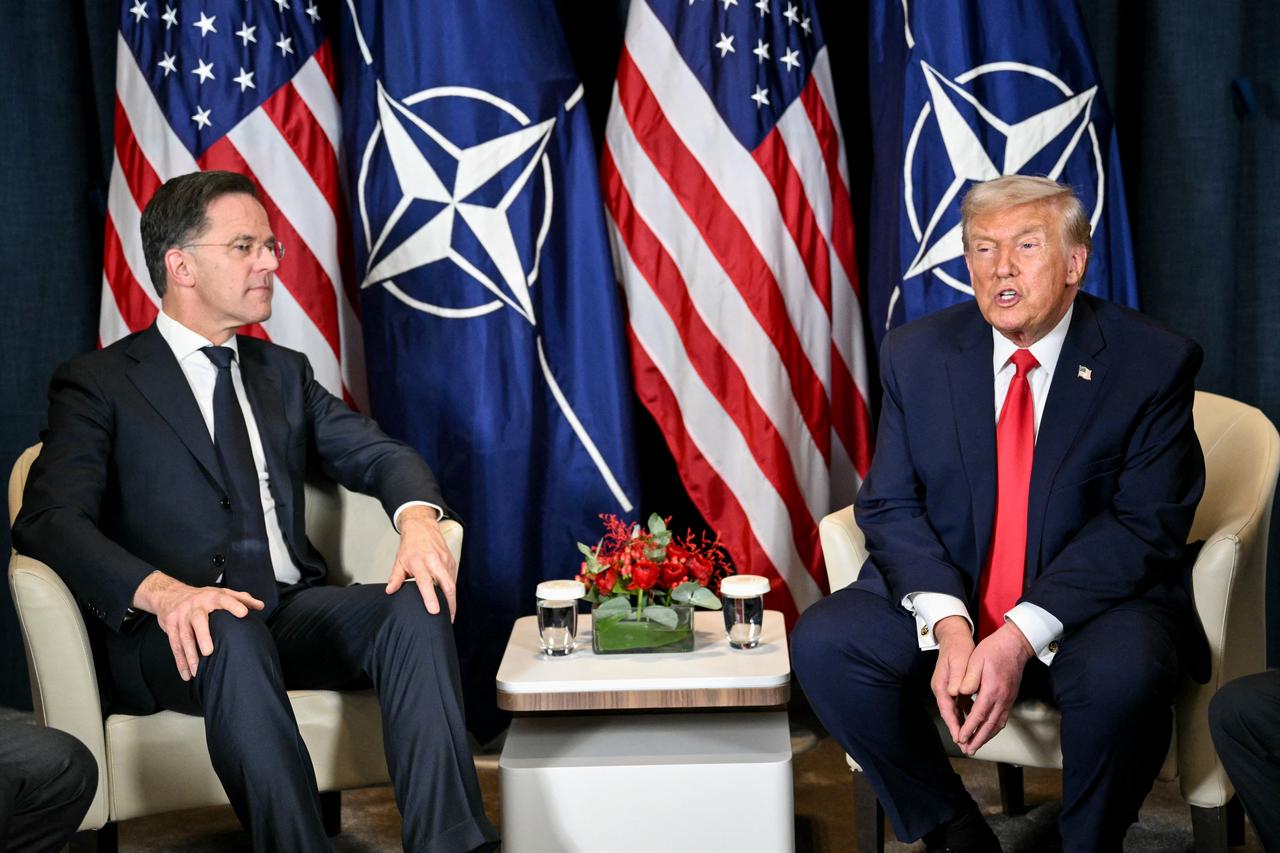 US President Donald Trump (R) speaks with NATO’s Secretary-General Mark Rutte during a bilateral meeting on the sidelines of the World Economic Forum (WEF) annual meeting in Davos, Switzerland on January 21, 2026. (AFP Photo)