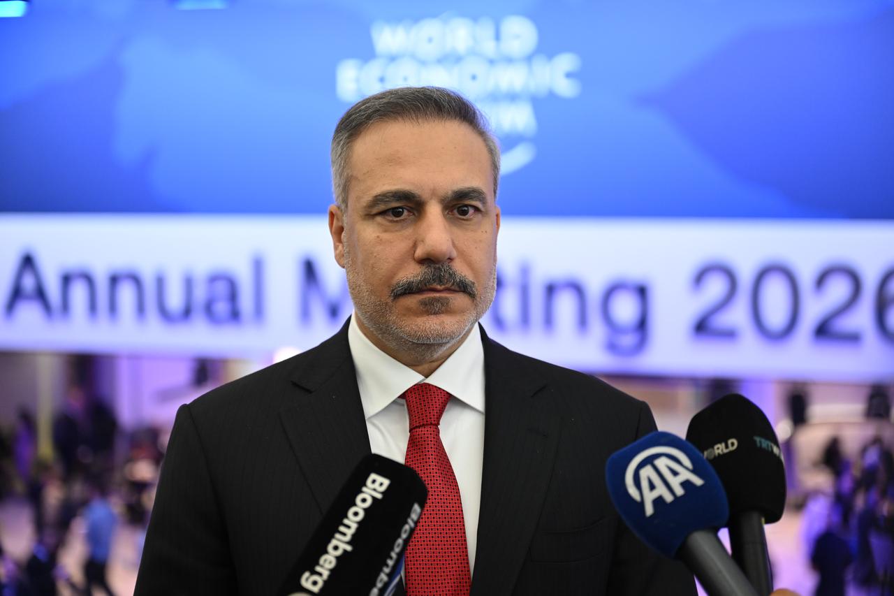 Foreign Minister Hakan Fidan speaking to the press after the signing ceremony of the Peace Council Charter in Davos, Switzerland, Jan. 22, 2026. (AA Photo)