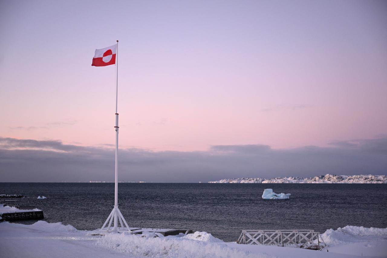A Greenlandic flag flutters in the wind in Nuuk, Greenland, on January 20, 2026. (AFP Photo)