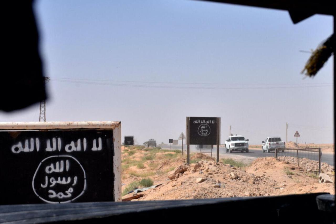 Billboards show the logo of Daesh group near the village of al-Maleha, in the northern countryside of Deir Ezzor, Syria on Sept. 9, 2017. (AFP Photo)