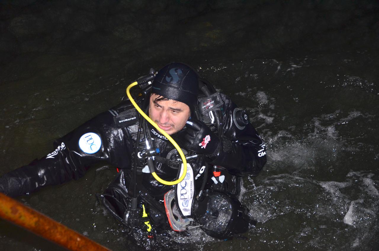 Mazlum Kibar emerges from the water after completing a more than 13-hour test dive in Izmit Gulf, northwest Türkiye, ahead of his planned cold-sea endurance record attempt. (AA Photo)