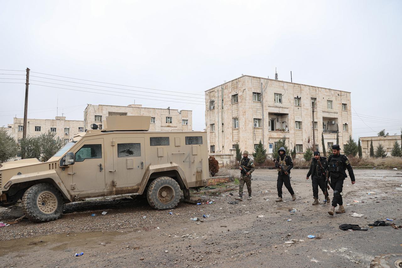 Syrian army units take security measures at the al-Aktan Prison and its surroundings after the Syrian army gained control of the prison in Raqqa, Syria, Jan. 23, 2026. (AA Photo)