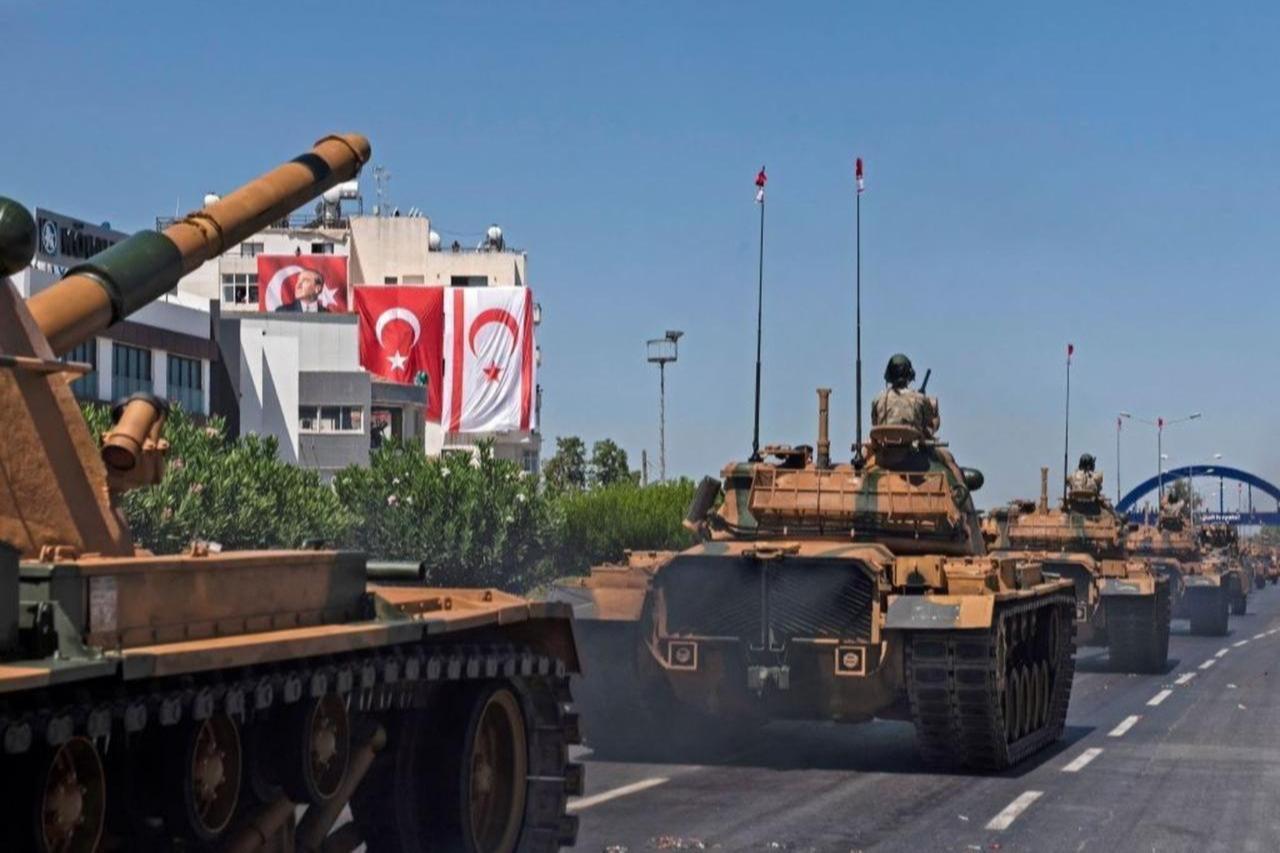 Soldiers take part in a military parade in the northern part of Turkish Cypruss Nicosia, July 20, 2021. (AFP Photo)