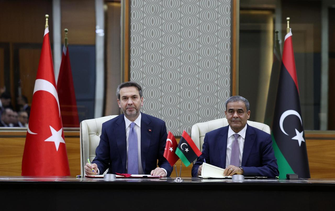 Türkiye’s minister of energy and natural resources, Alparslan Bayraktar, with Libya’s minister of transport Mohammed Shahoubi signing of a memorandum of understanding, Jan 24 , 2026 ( Photo via X / @aBayraktar1)