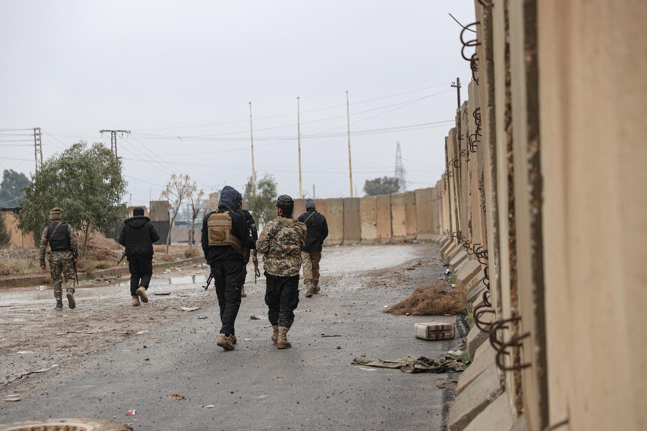 Syrian army units take security measures at the al-Aktan Prison and its surroundings after the Syrian army gained control of the prison in Raqqa, Syria, January 23, 2026. (AA Photo)