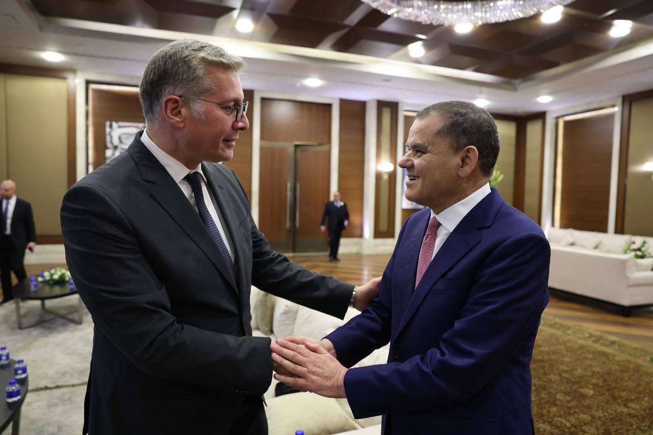 Libyan Prime Minister Abdulhamid Dbeibeh (R) discusses ways to enhance cooperation between the two countries in the oil, natural gas, and energy sectors with Egyptian Minister of Petroleum and Mineral Resources Karim Badawi in Tripoli, Libya, January 24, 2026. (AA Photo)