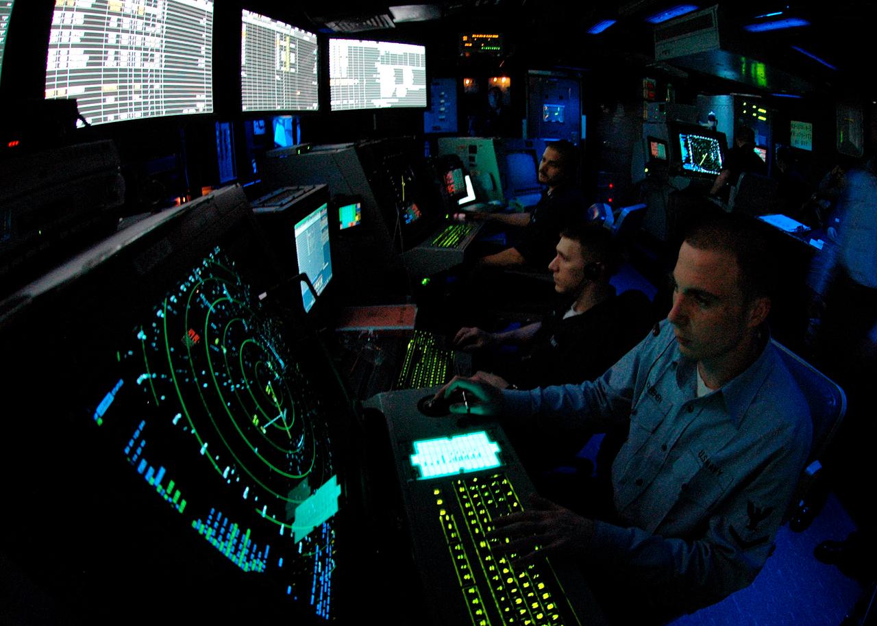 Air Traffic Controller 3rd Class David McKeehe works approach controller in Carrier Air Traffic Control Center (CATTC) aboard the Nimitz-class aircraft carrier USS Abraham Lincoln on May 5, 2006. (U.S. Navy Photo)