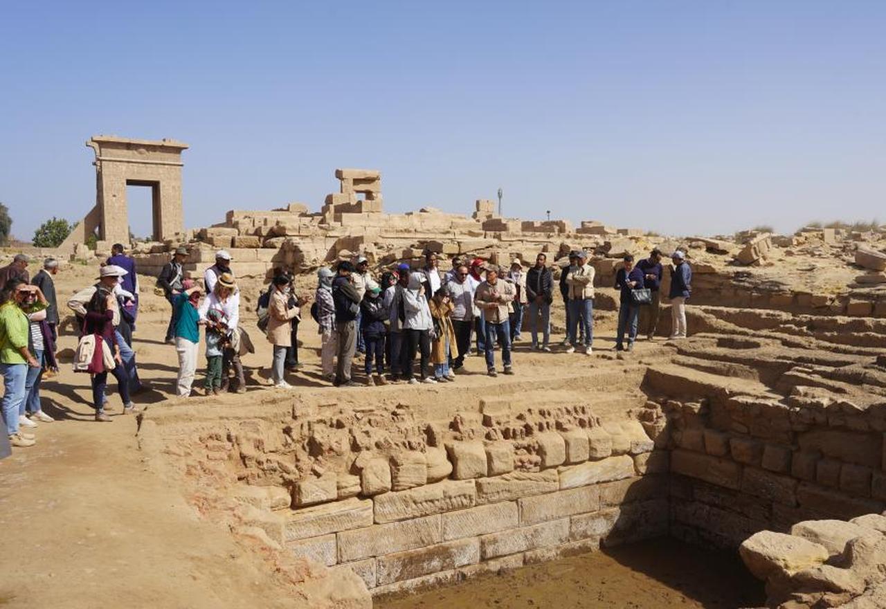 Guests visit the ruins of the "sacred lake" at the Montu Temple precinct in the Karnak Temple Complex in Luxor, Egypt, Jan. 24, 2026. ( Photo via XinHua)