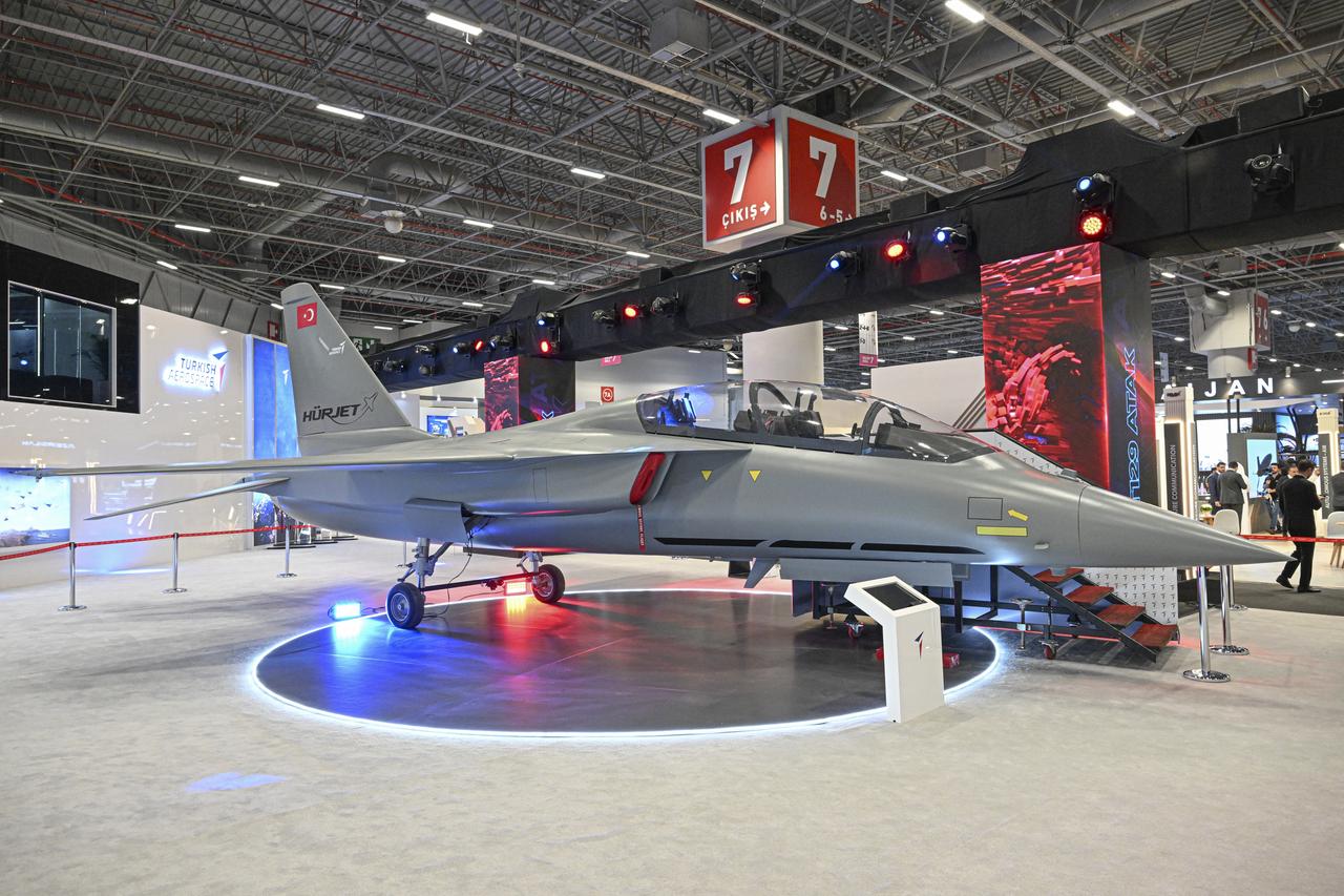 TAI's Hurjet as people visit the stands during IDEF 2025, at the Istanbul Expo Center in Istanbul, Türkiye, on July 22, 2025. (AA Photo)