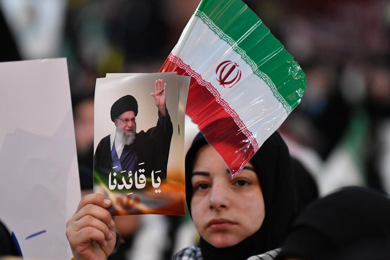 A group gathers in the Dahieh district, known as Hezbollah’s stronghold, carrying Hezbollah and Iranian flags to protest a possible US attack on Iran, in Beirut, Lebanon, Jan. 26, 2026. (AA Photo)