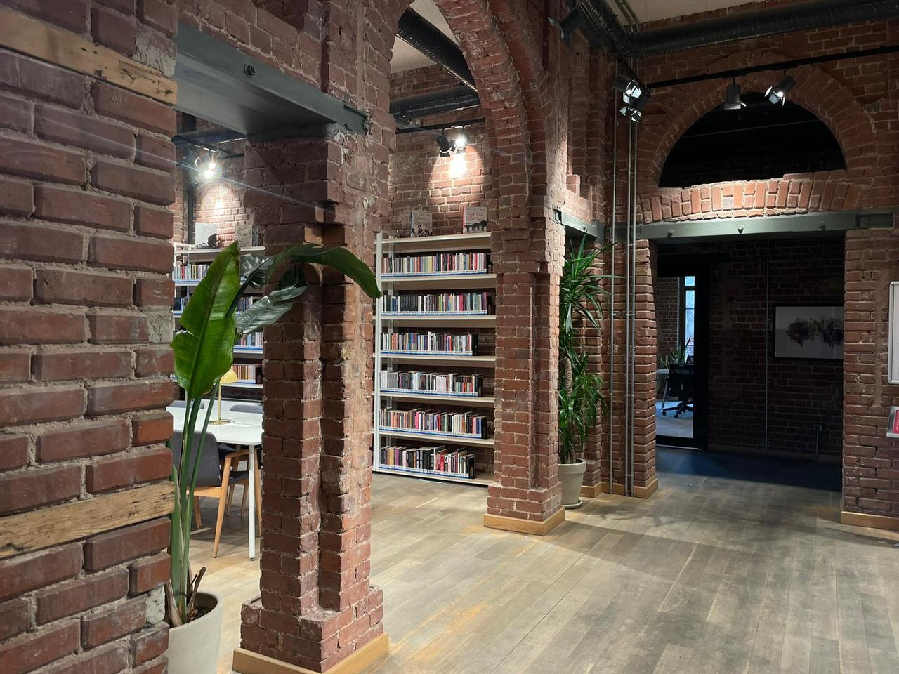 An interior view of library shelves framed by brick columns inside Bulgur Palace in Istanbul, Türkiye, Jan. 26, 2026. (Photo by Koray Erdogan/Türkiye Today)