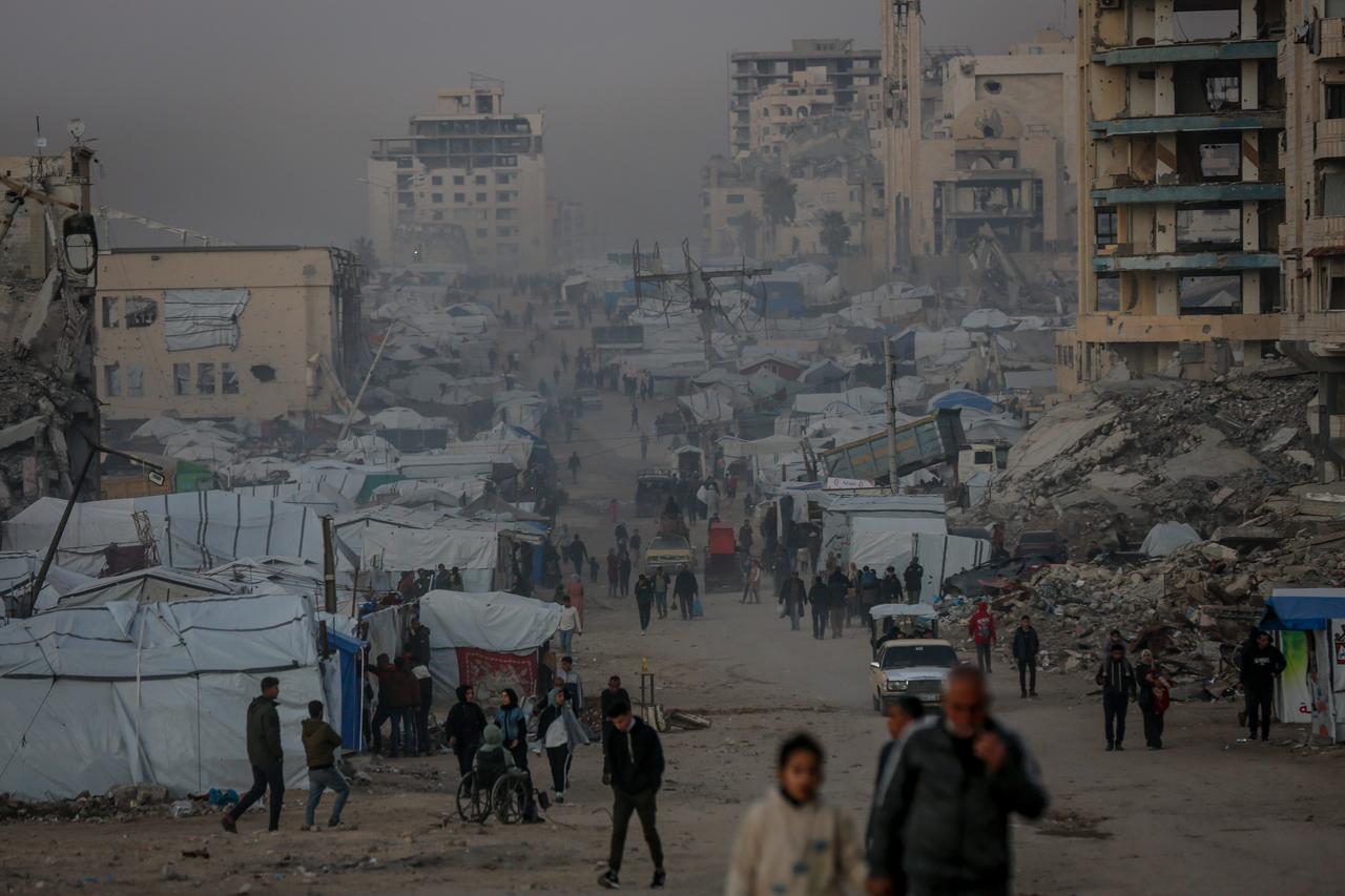 A view of a street as displaced Palestinians struggle to maintain their daily lives amid the rubble left behind by Israeli attacks in Gaza City, Gaza on Jan. 26, 2026. (AA Photo)