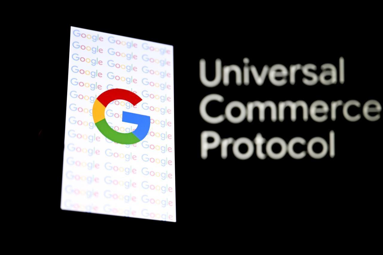 Photo illustration shows the 'Universal Commerce Protocol (UCP)' logo on a screen behind the 'Google' logo displayed on a mobile phone in Ankara, Türkiye, January 27, 2026. (AA Photo)