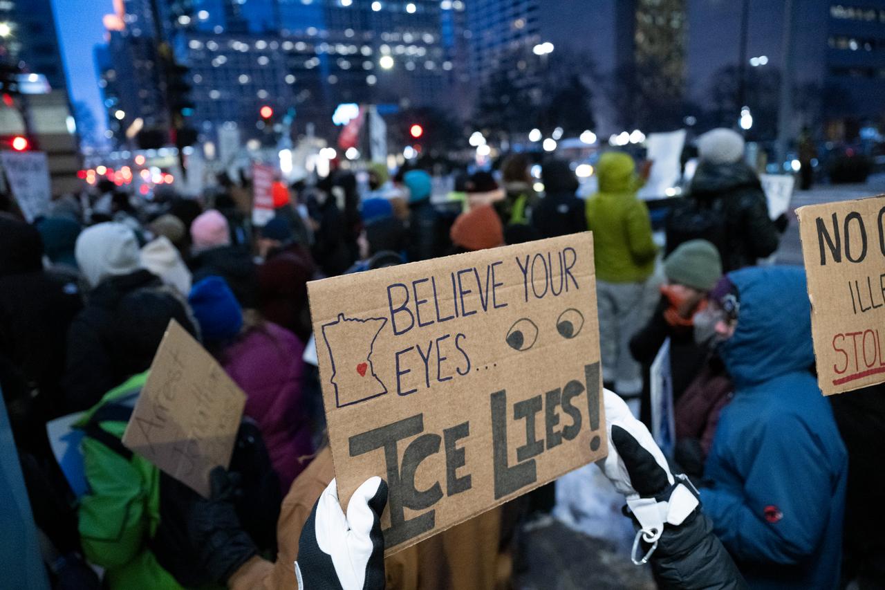 Demonstrators gather to protest against US Immigration and Customs Enforcement (ICE) outside the state office of US Senator Amy Klobuchar, Minneapolis, Minnesota, on January 26, 2026. (AFP Photo)
