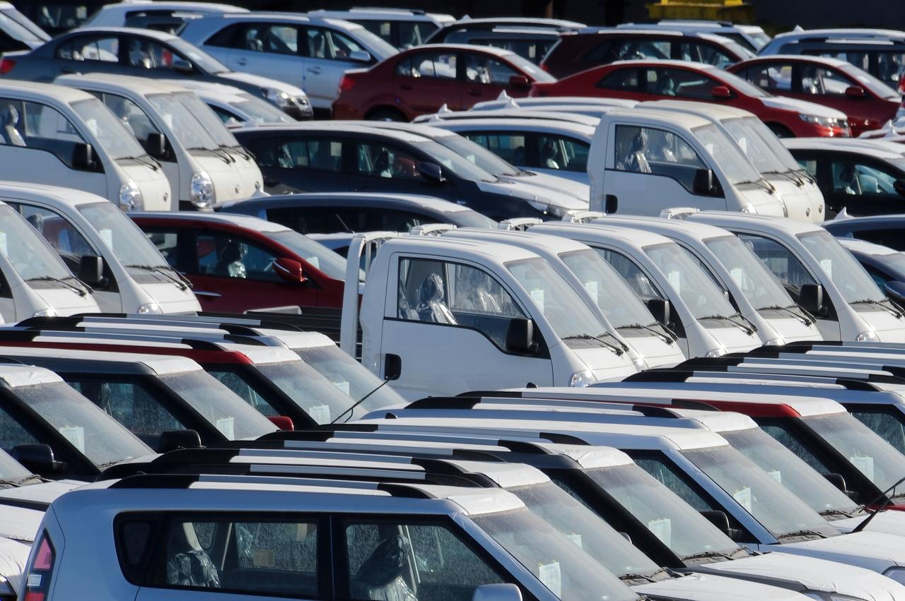 Rows of South Korean export vehicles at a port in South Korea. (Adobe Stock Photo)
