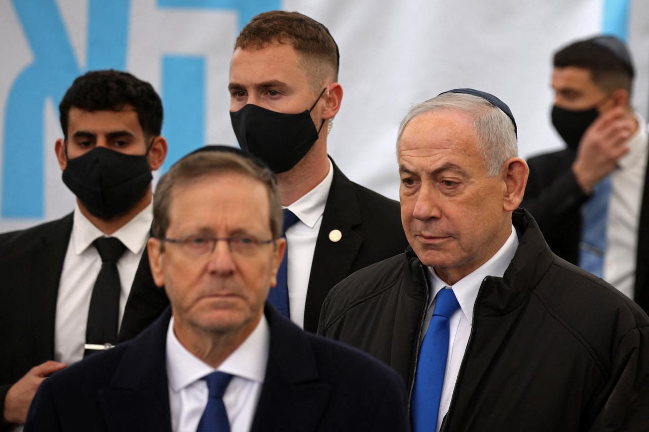 Israel's Prime Minister Benjamin Netanyahu (R) arrives to attend the funeral of Israeli hostage Ran Gvili, in the southern town of Meitar on January 28, 2026. (AFP Photo)