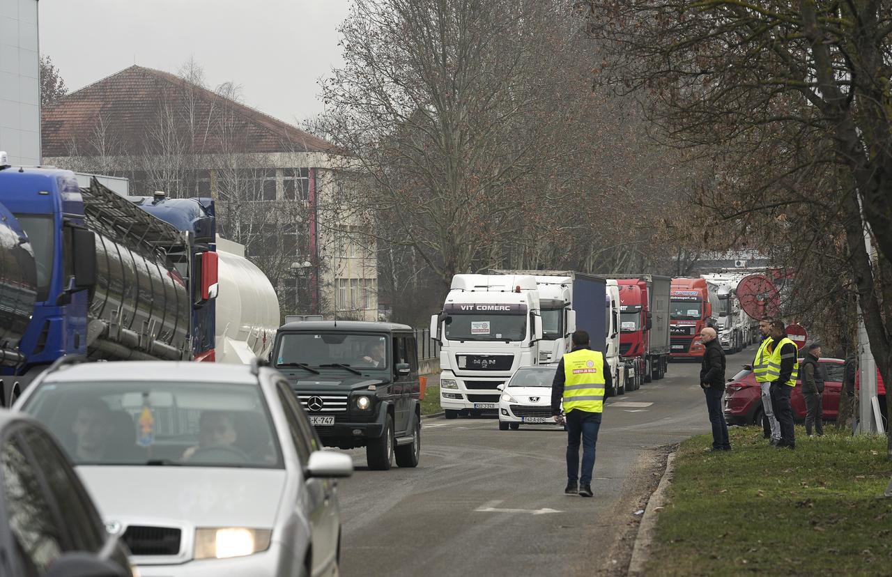 Truck and lorry drivers gather to stage a protest against new transit rules imposed by the European Union (EU) for the Schengen Area in Sarajevo, Bosnia and Herzegovina on Jan. 28, 2026. (AA Photo)