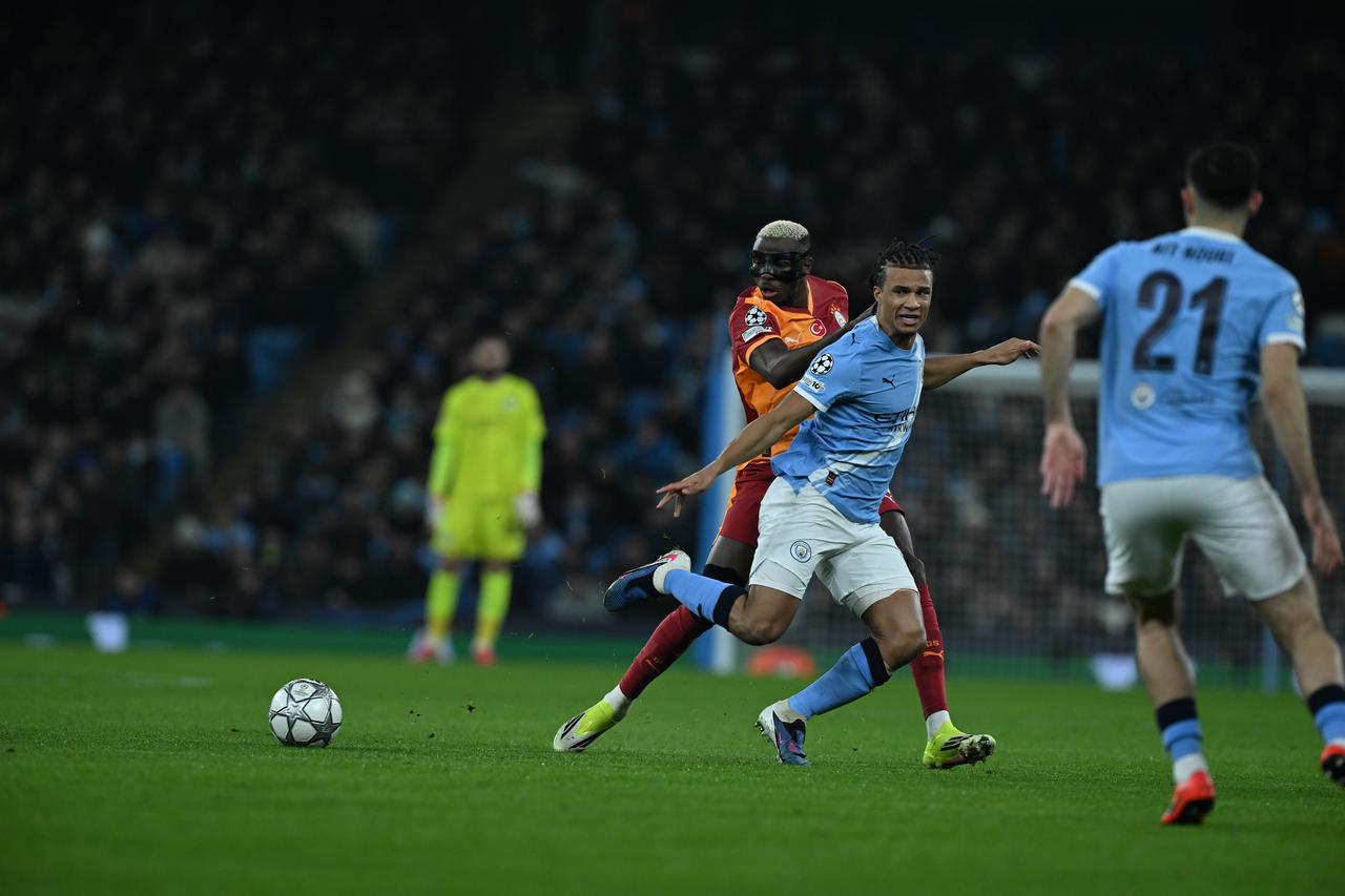 Galatasaray player Victor Osimhen (45) in action against his opponent during the UEFA Champions League Matchday 8 match against Manchester City at Etihad Stadium in Manchester, United Kingdom, on January 28, 2026. (AA Photo)