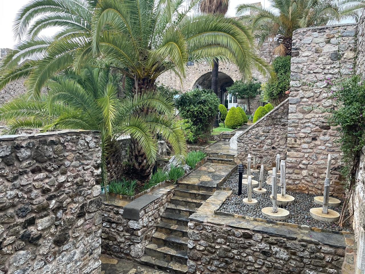 Stone pathways and vaulted structures inside Marmaris Castle guide visitors through indoor and outdoor exhibition areas of Marmaris Museum in Mugla, Türkiye, Jan. 27, 2026. (Photo by Koray Erdogan/Türkiye Today)