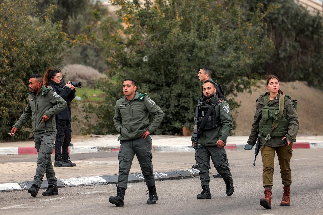 Israeli border guards walk together near the scene of a reported stabbing attack near the Tunnel Checkpoint area in Jerusalem on January 28, 2026. (AFP Photo)