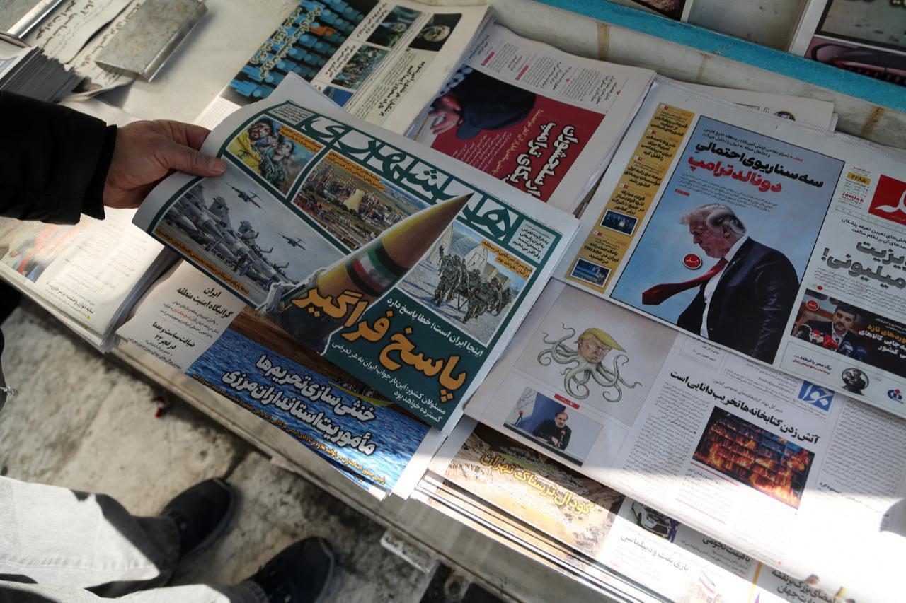 Newspapers in Iran's capital, Tehran, prominently featured statements by US President Donald Trump, Jan. 28, 2026. (AA Photo)