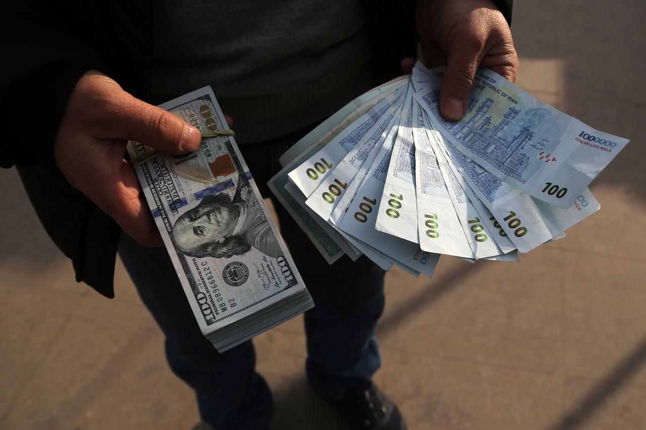 A view of the U.S dollars and Iranian rials in Tehran, Iran on December 31, 2025. (AA Photo)